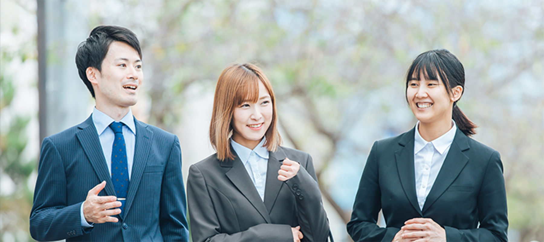 ビジネススーツを着た若者たち